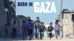 Born in Gaza poster. Boys running up on a street in Gaza